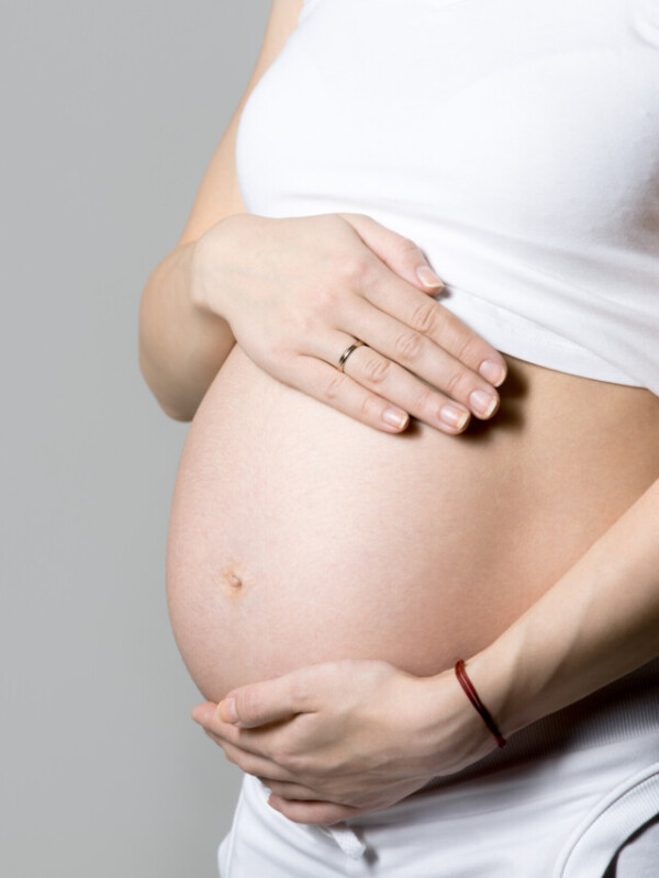 Mom-to-be, close-up of belly